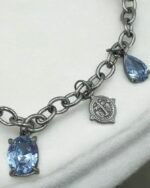 Βραχιόλι από ανοξείδωτο ατσάλι με κρεμαστά στοιχεία χρώμα ασημί-BR-401 - Image 2