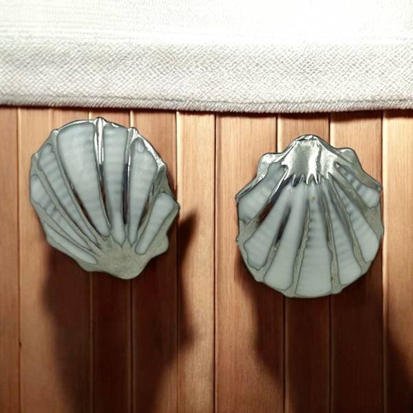 Σκουλαρίκια ατσάλινα αχιβάδα άσπρη.χρώμα ασημί